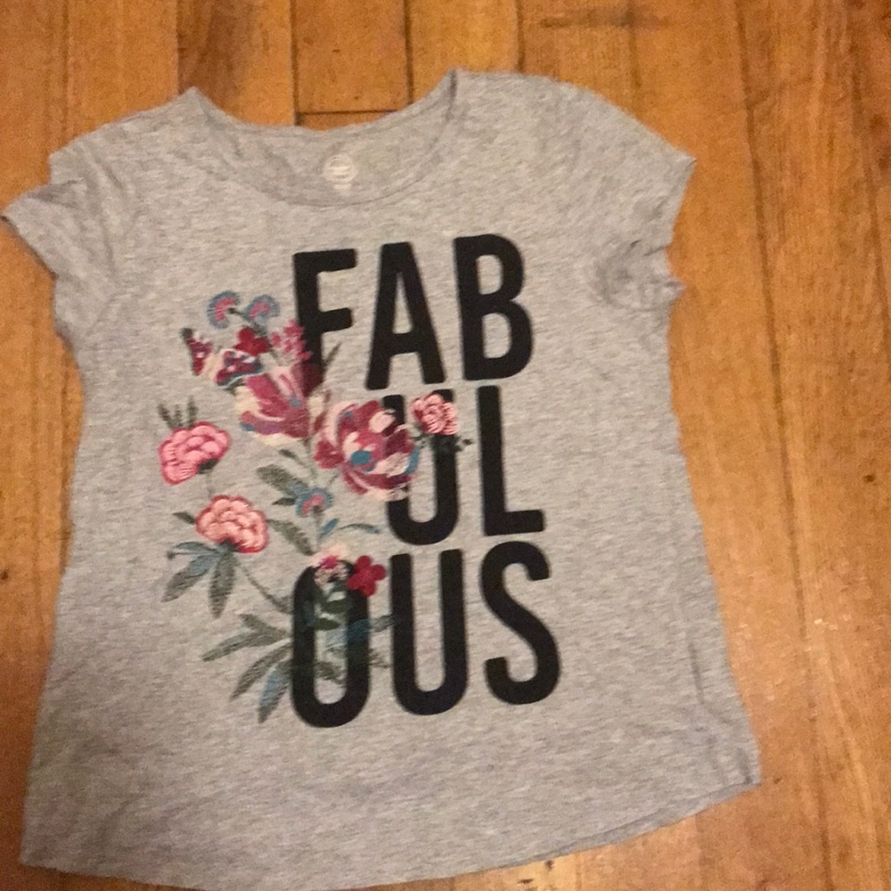 A grey t-shirt with black fabulous Plus shipping